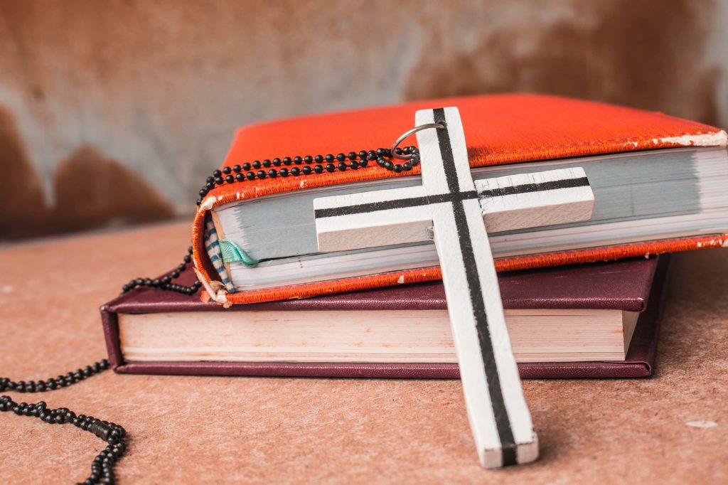 Crosses and books