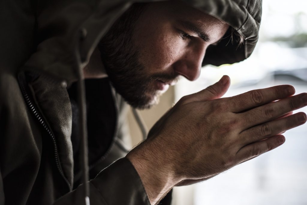 Thoughtful Homeless People Feeling Cold in Winter